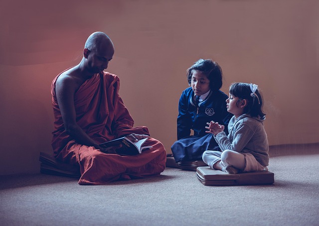 Teacher reading a story to a group of children